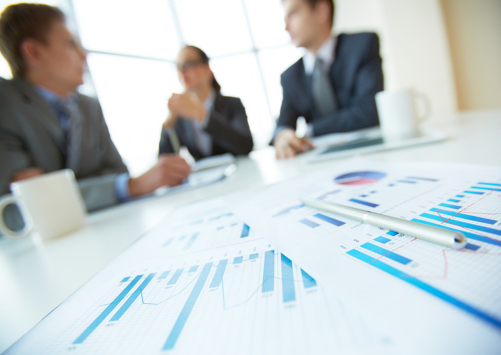 Close Up Of Business Documents Lying On The Desk Office Workers