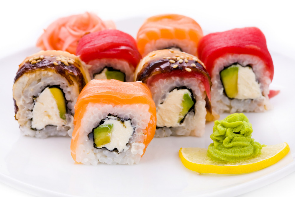 Image of maki sushi rolls served with wasabi