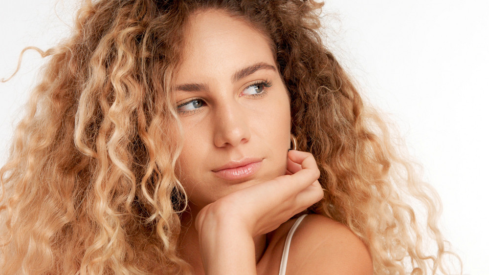 Closeup Portraitof Green Eyed Model With Big Curly Blonde Hair