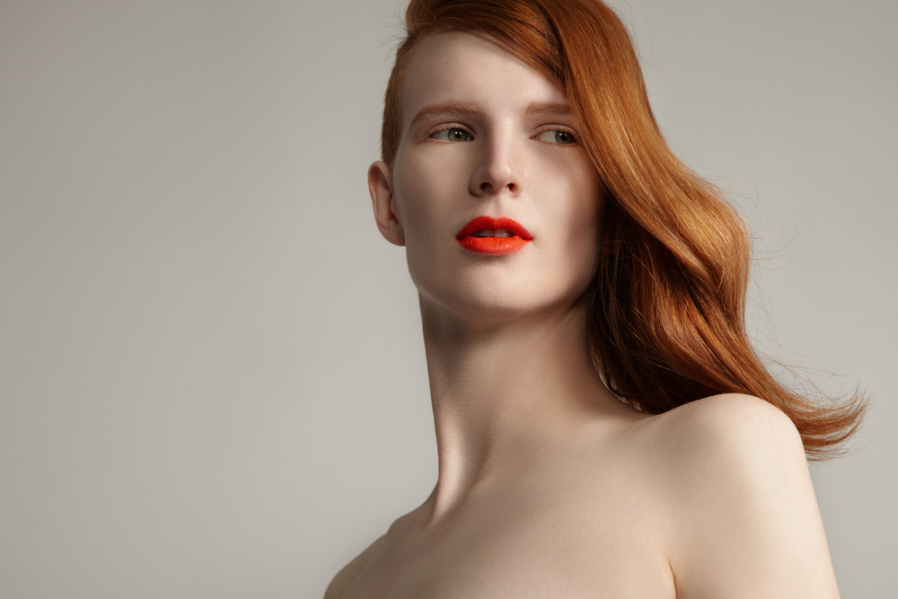 ginger hair model portrait with ideal beauty skin. closeup portrait