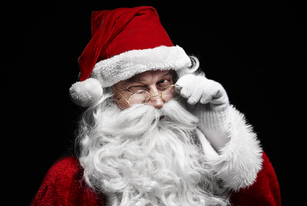 Man In Santa Claus Costume Winking