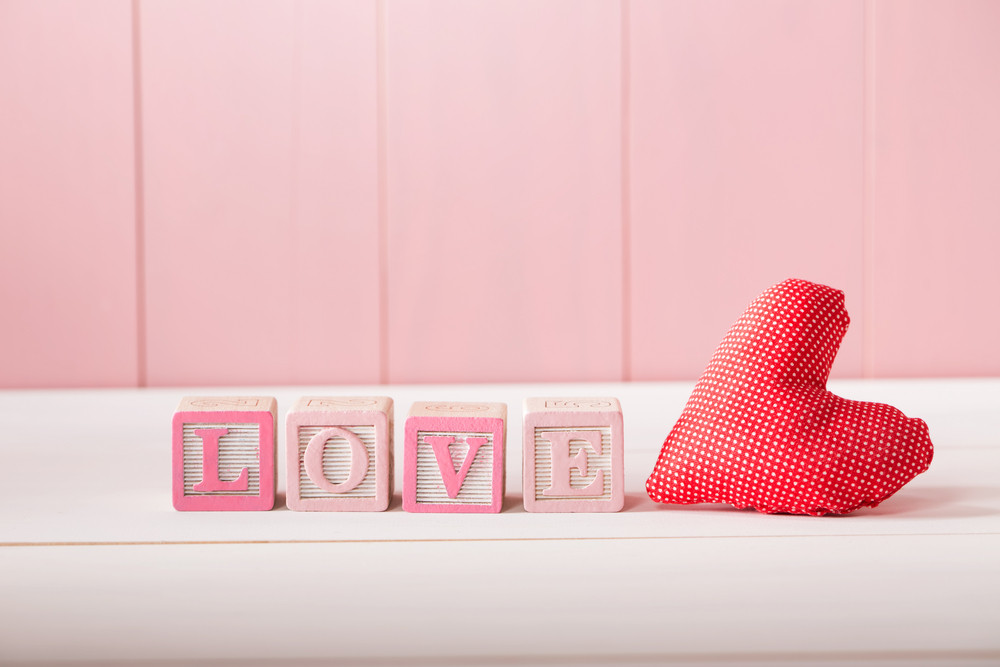 pink wooden alphabet blocks