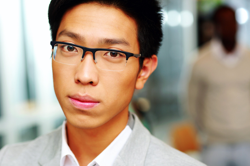 Closeup Portrait Of A Handsome Asian Man In Glasses Royalty Free Stock Image Storyblocks