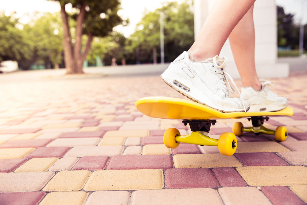 Female legs on skateboard Royalty-Free Stock Image - Storyblocks