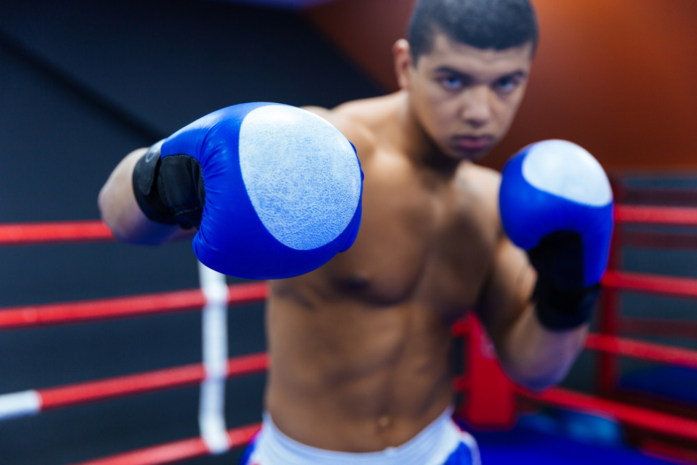 Download Boxer fighting in boxing ring Royalty-Free Stock Image ...