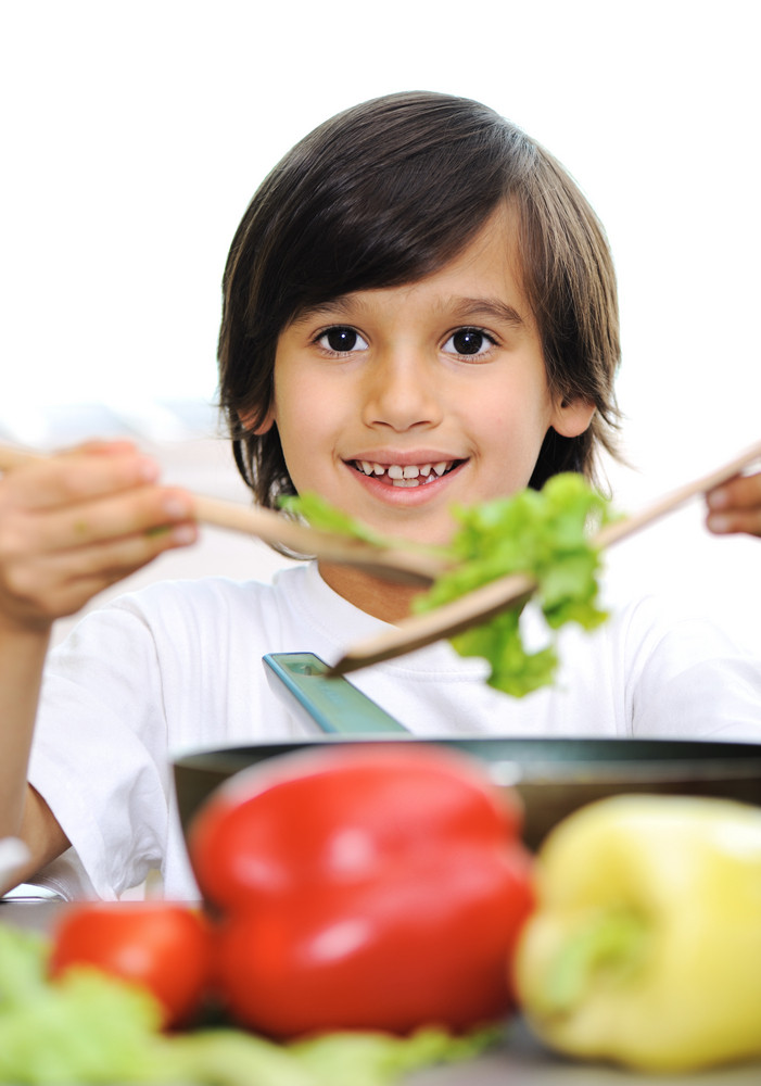 Little boy alone cooking in the kitchen Royalty-Free Stock Image ...