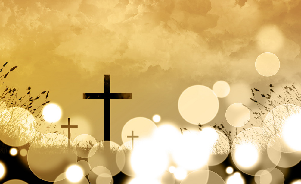 A cross background with grass and bokeh