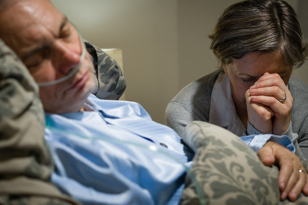 Old Wife Praying For Terminally Ill Husband Lying In Coma Royalty Free Stock Image Storyblocks 8151