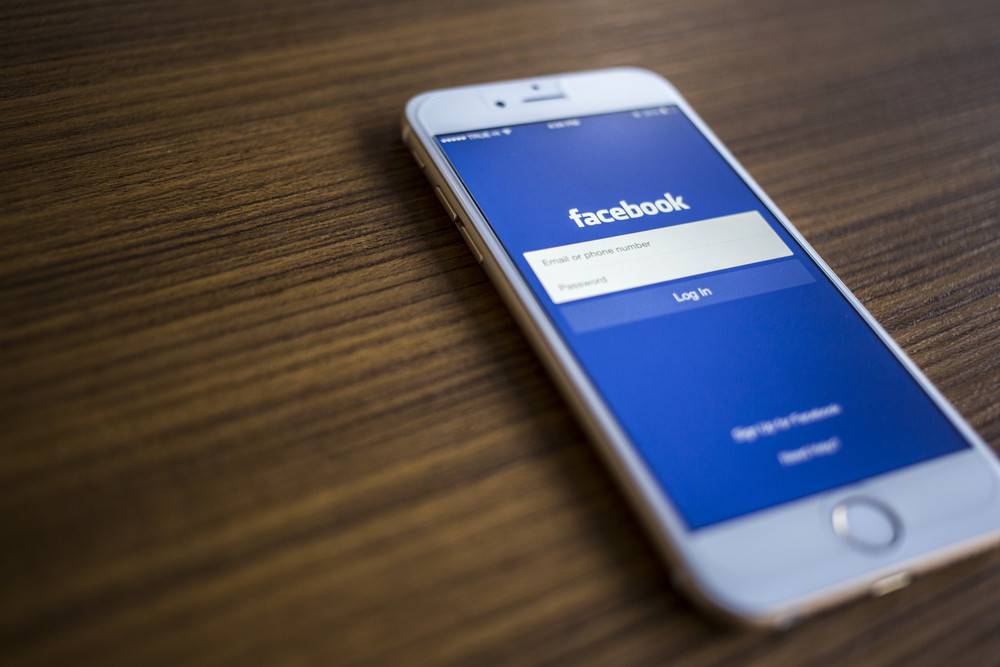 CHIANG MAI, THAILAND - JANUARY 02, 2015: Facebook Login page application using Apple iPhone 6. Facebook is largest and most popular social networking site in the world.