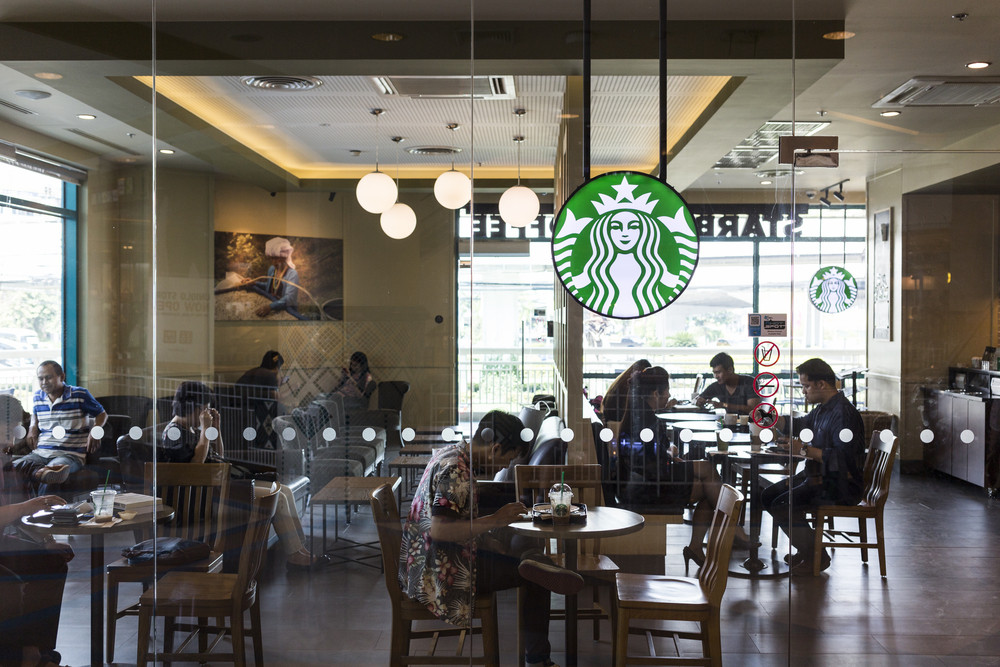 CHIANG MAI, THAILAND - OCTOBER 02, 2014: Starbucks coffee cafe at Chiang Mai Central Airport department store branch.