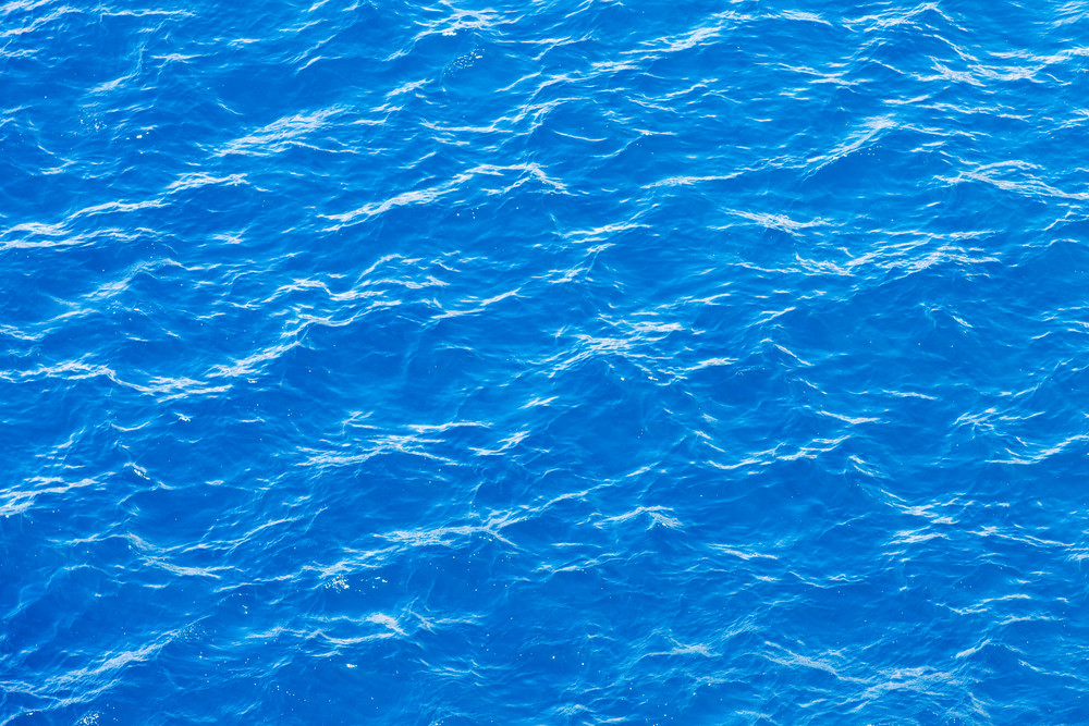 Close up of sunlit ocean water Royalty-Free Stock Image - Storyblocks