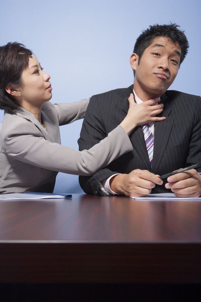 Fighting businesspeople in office