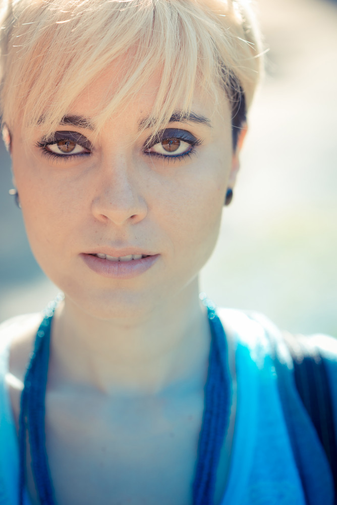 Beautiful Young Blonde Short Hair Hipster Woman In The City