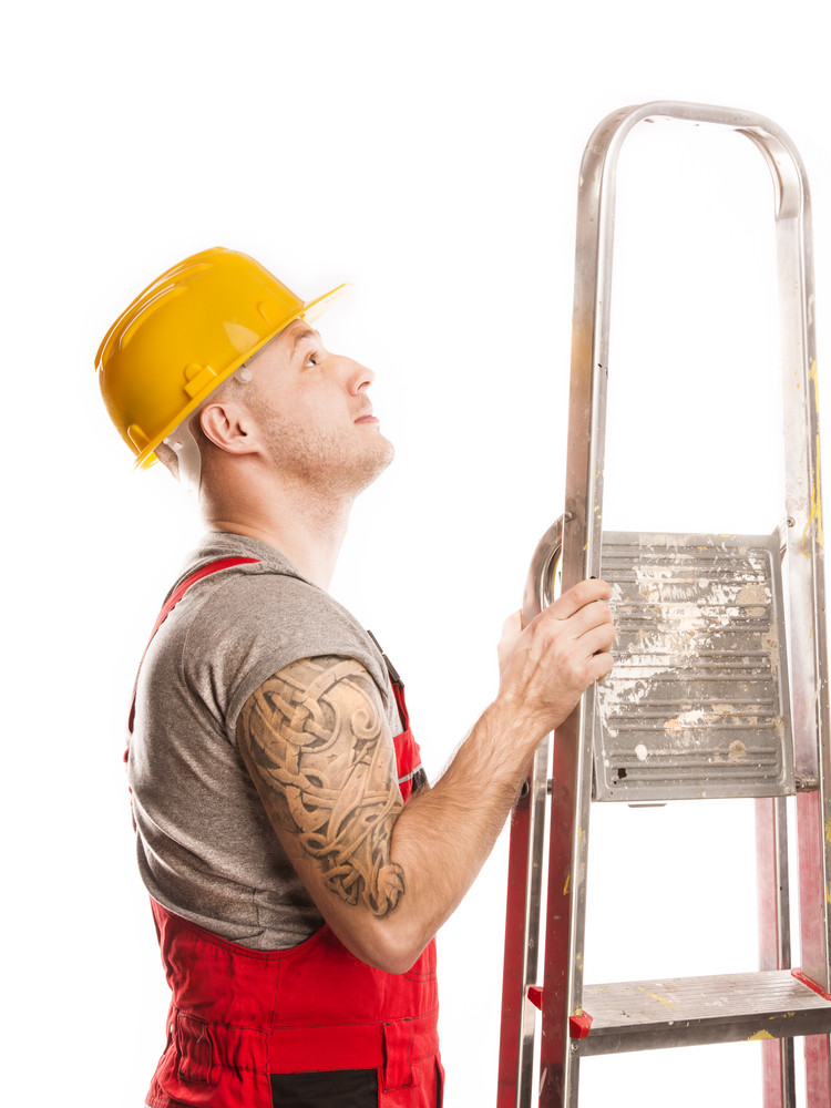 Download Construction worker in a protective helmet isolated over ...