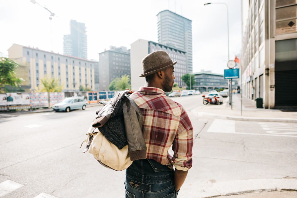 Download Half length of young handsome afro black man walking in ...