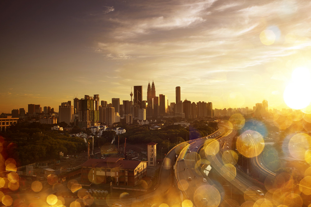 Kuala Lumpur Skyline. Abstract cityscape view with effect blur, bokeh, light point, color flows. The world of light and color.