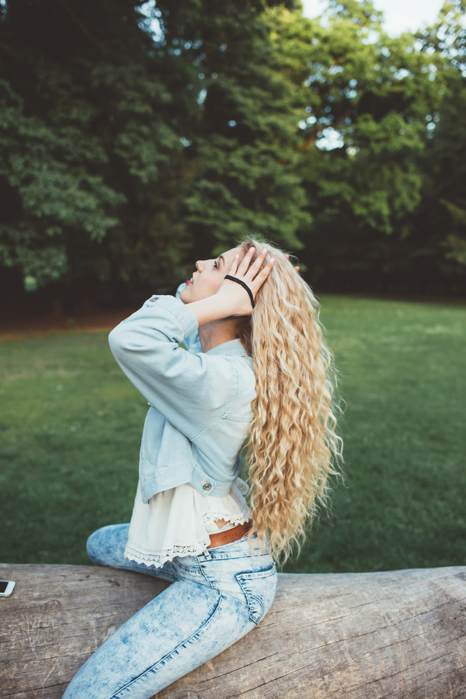 Young Beautiful Caucasian Long Wavy Blonde Hair Millennial Woman