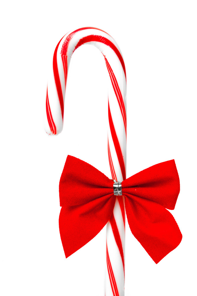 Christmas Candy Cane with Red Bow Royalty-Free Stock Image - Storyblocks