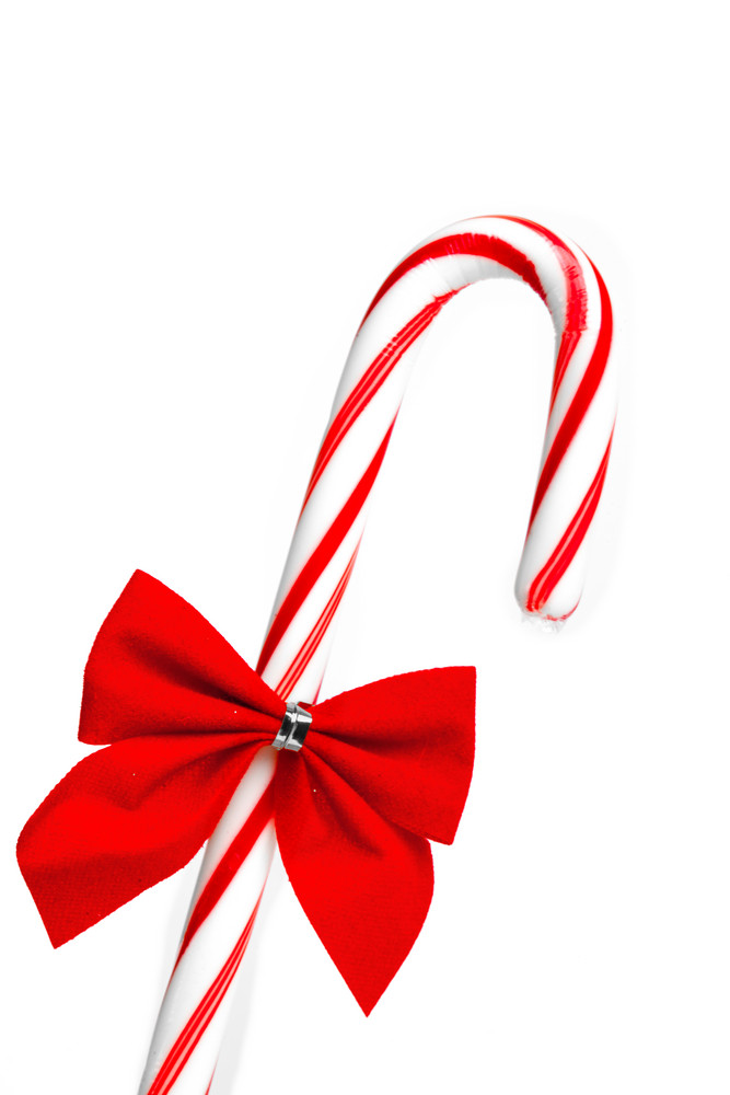 Christmas Candy Cane with Red Bow Royalty-Free Stock Image - Storyblocks