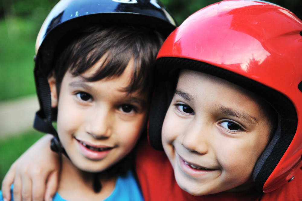 Little boys with biking safety helmet portrait