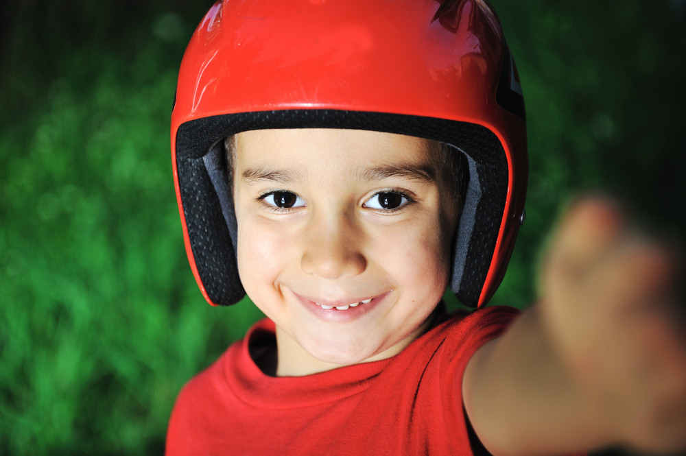 kid with helmet on