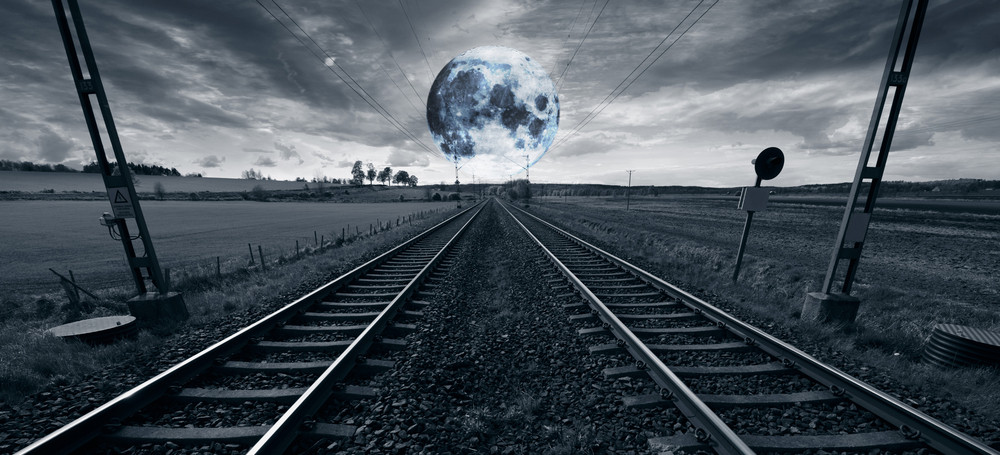 lonely train track and full moon