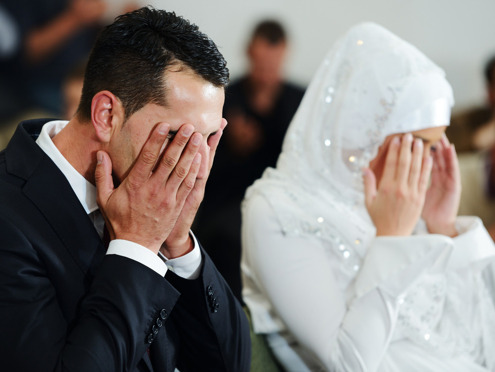 Muslim Bride And Groom At The Mosque During A Wedding Ceremony