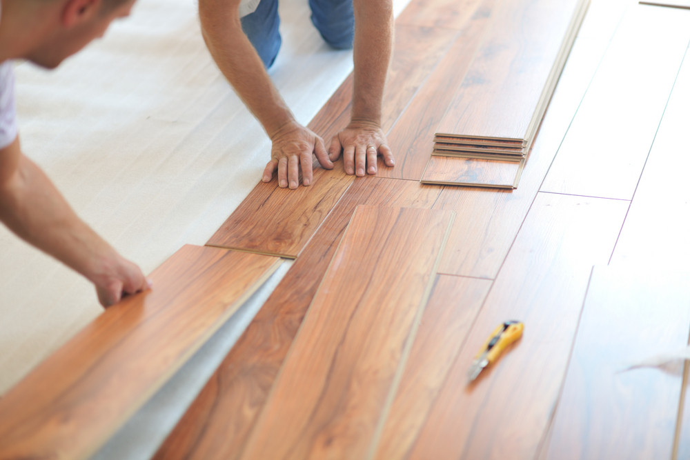 Installing Laminate Flooring Royalty Free Stock Image