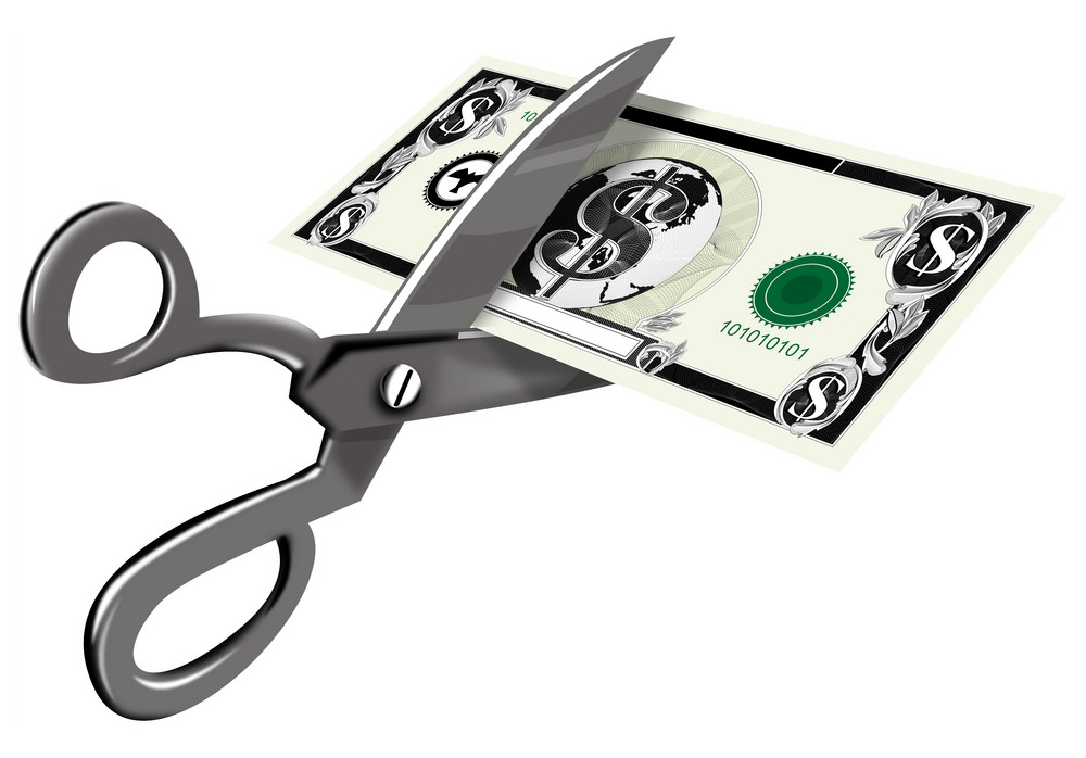 Scissors Cutting Dollar Bill Royalty-Free Stock Image - Storyblocks