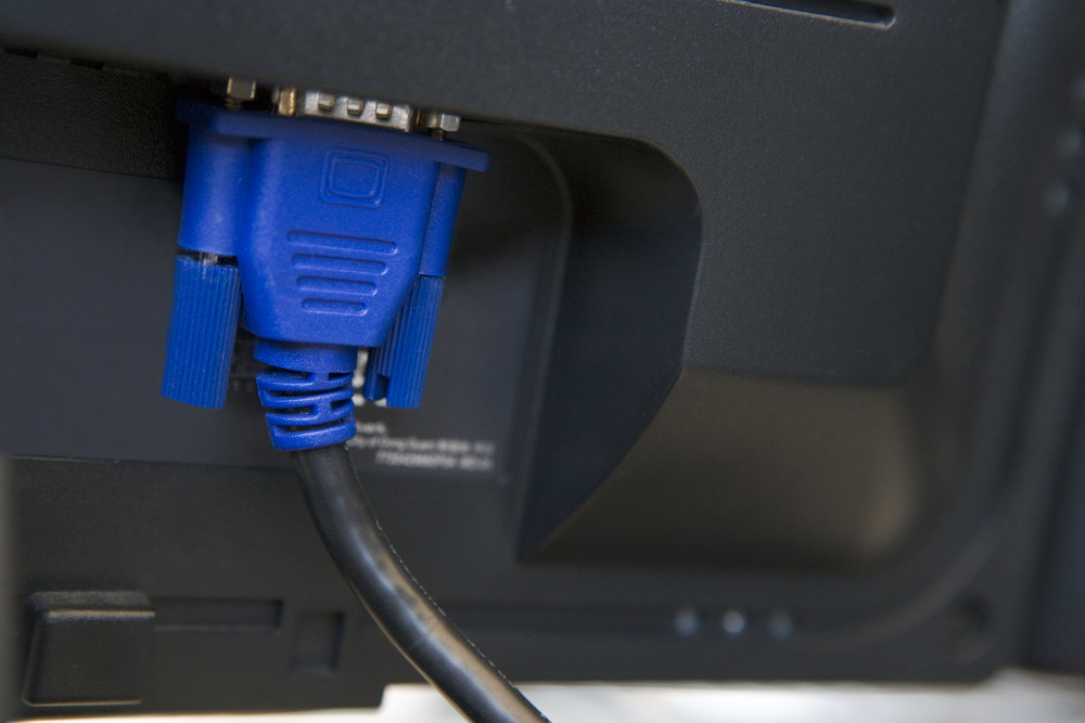 Shot of a cable plugged into a computer monitor