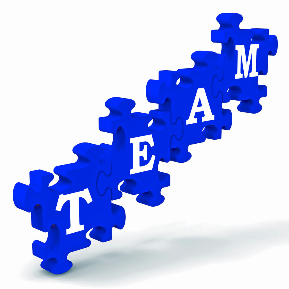 Team Puzzle Showing Partnership Royalty-Free Stock Image - Storyblocks