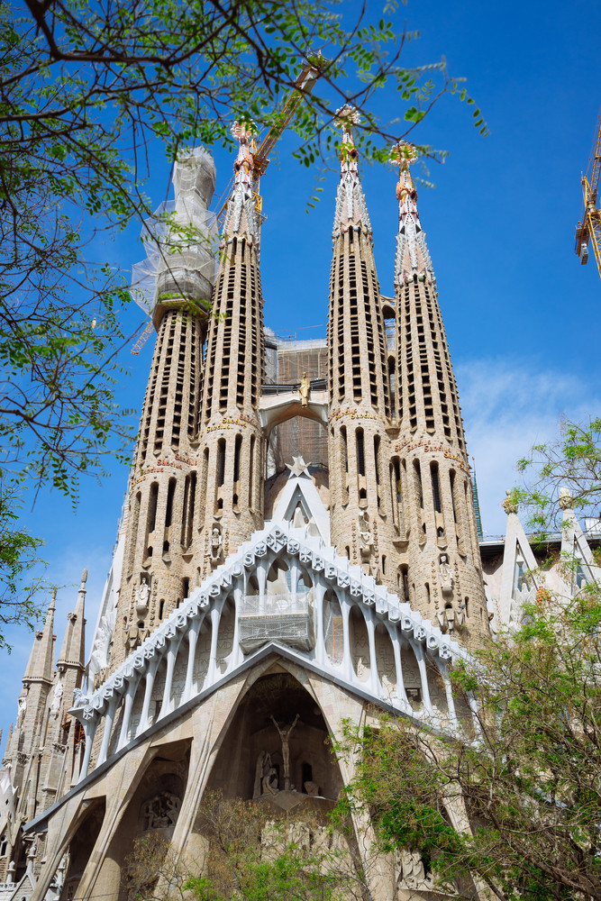BARCELONA, SPAIN - April 25, 2018: La Sagrada Familia - the impressive cathedral designed by Gaudi, which is being build since 19 March 1882 and planed finally be done in 2026, Barcelona, Spain