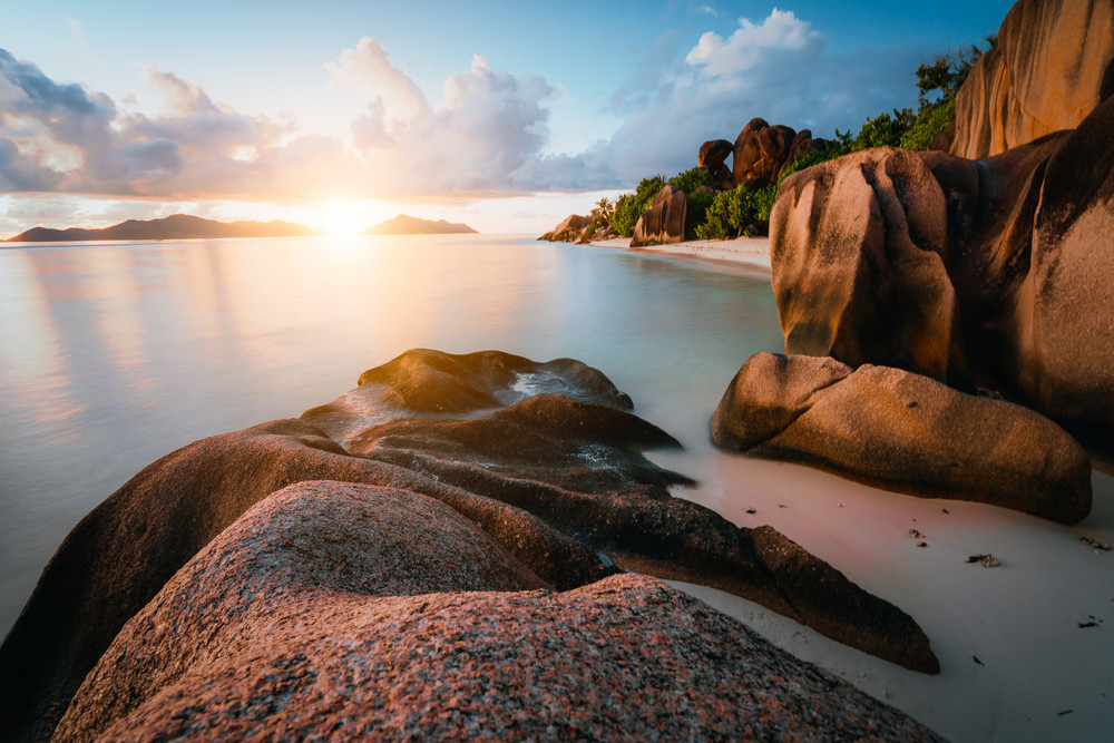 Dreamy sunset at the gorgeous exotic Anse Source d'Argent beach, La ...