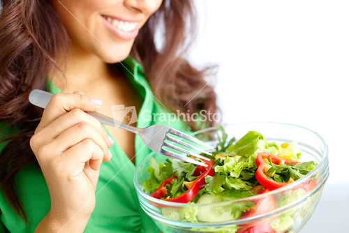 Close-up Of Pretty Girl Eating Fresh Vegetable Salad