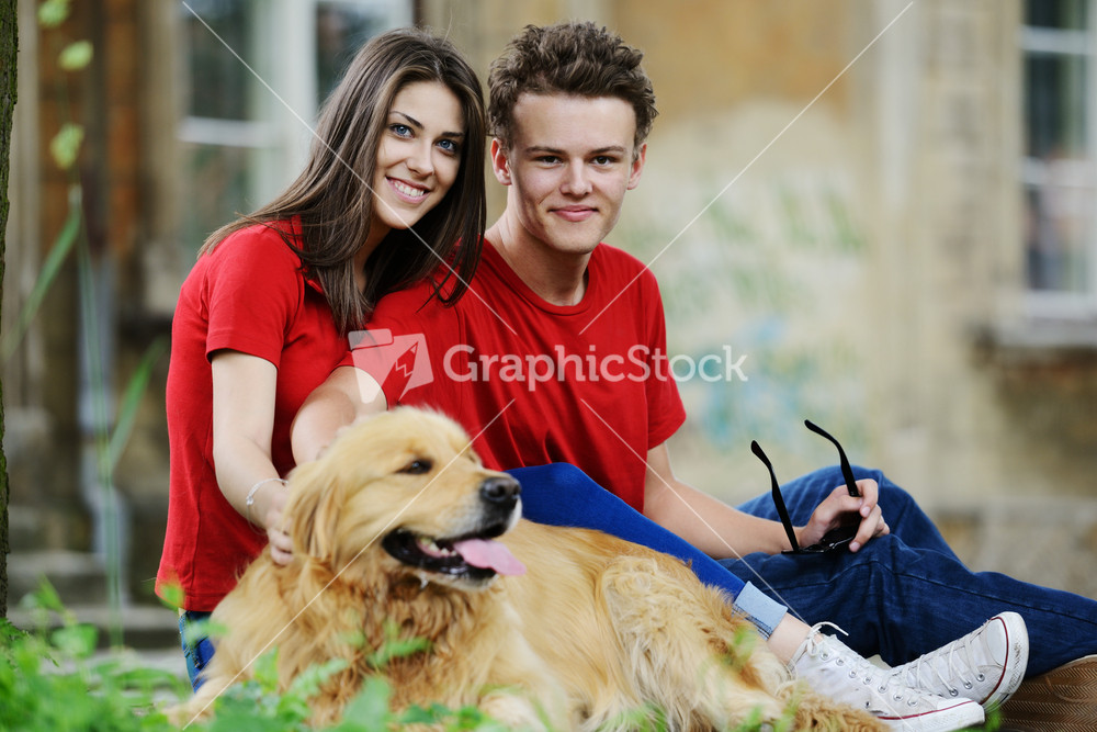 Young real people on the street with dog