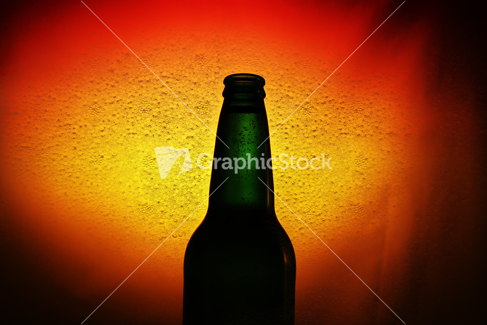Beer Bottle Against Abstract Beer Bubble Texture
