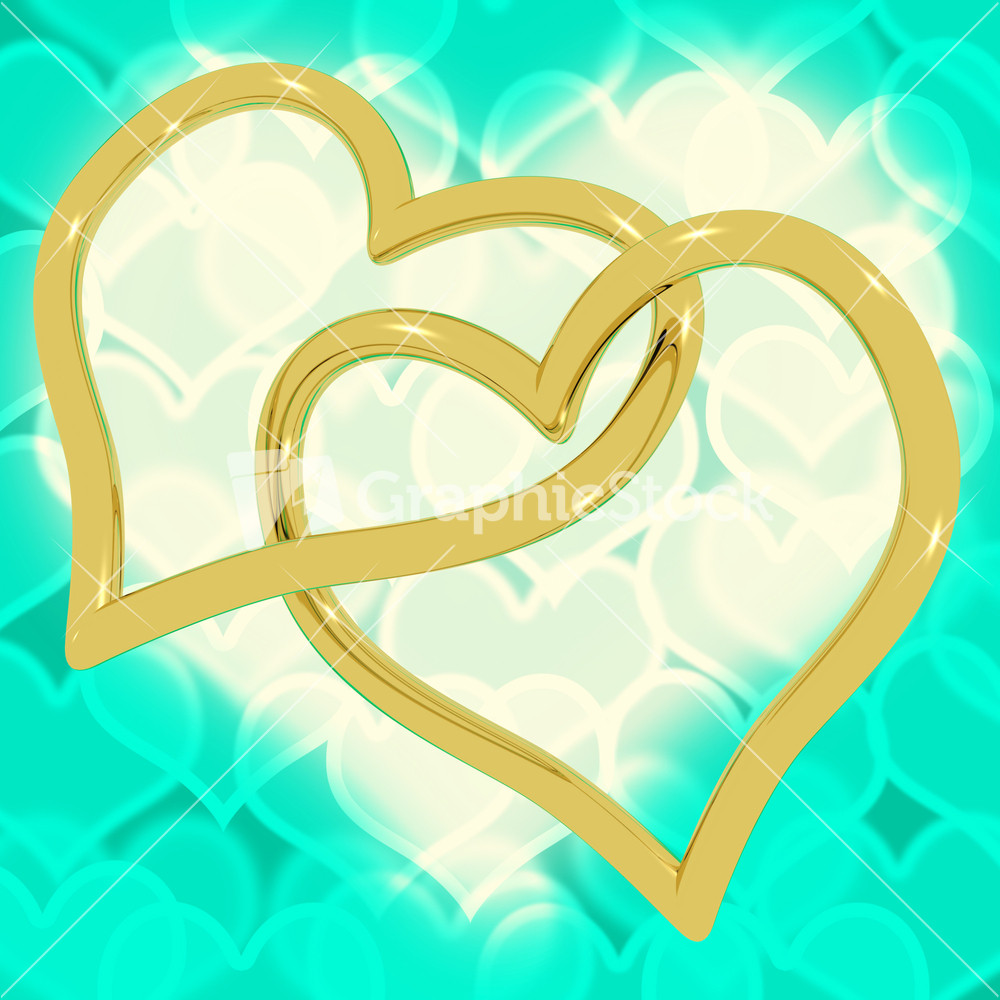 Gold Heart Shaped Rings On Turquoise Bokeh Representing Love And Romance