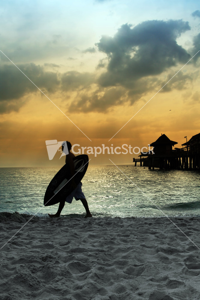 Surfer At The Beach