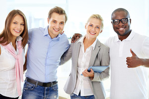 Portrait Of Successful Friends Doing Business Together